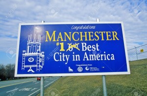 20515002-Road-sign-in-Manchester-NH-Best-City-in-America-Stock-Photo